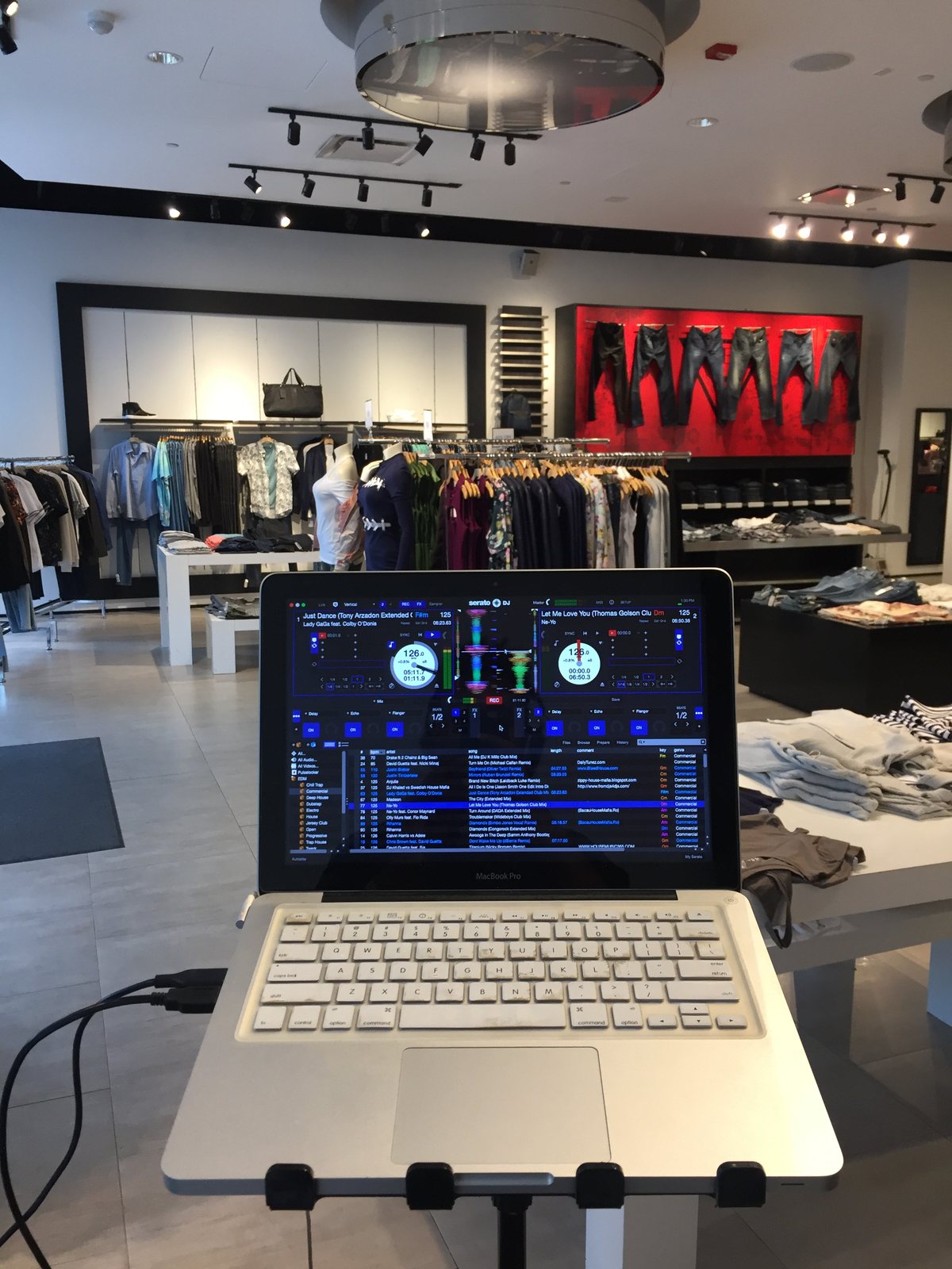 DJ setup on the retail floor at Guess, Michigan Avenue